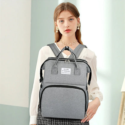 Portable folding crib, mommy bag, multi-functional, light and large-capacity leisure, double shoulder mother and baby bag.