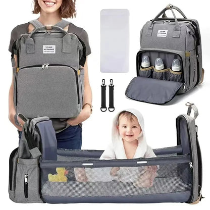 Portable folding crib, mommy bag, multi-functional, light and large-capacity leisure, double shoulder mother and baby bag.