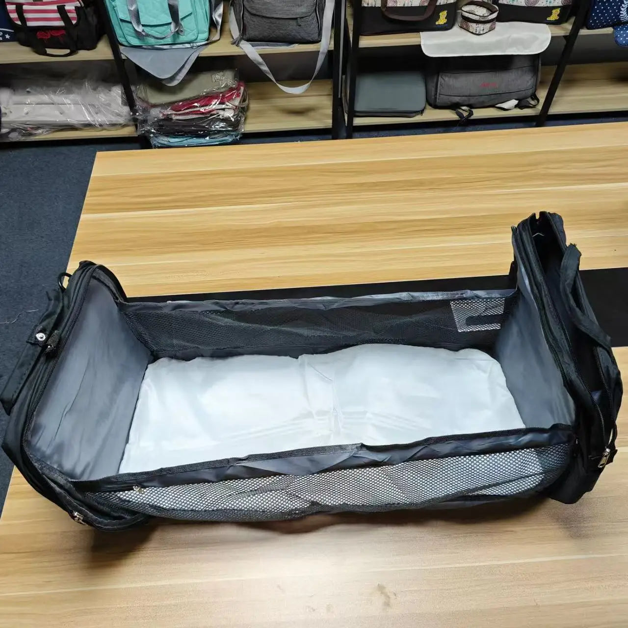 Portable folding crib, mommy bag, multi-functional, light and large-capacity leisure, double shoulder mother and baby bag.